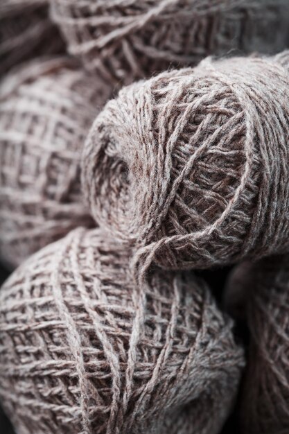 Light brown yarn made of natural sheep wool. Needlework