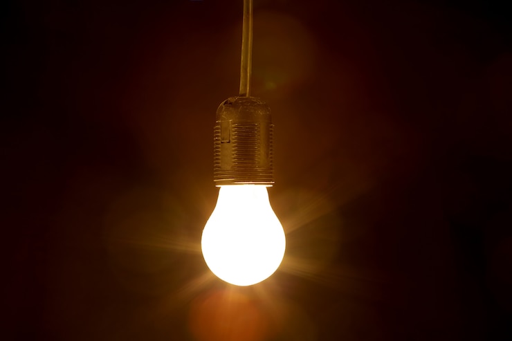 Photo light bulb on a black background