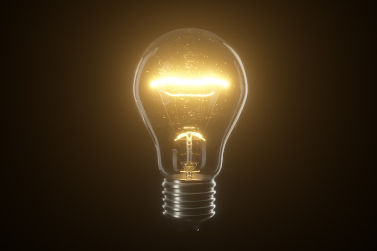 Photo light bulb lamp over black isolated background