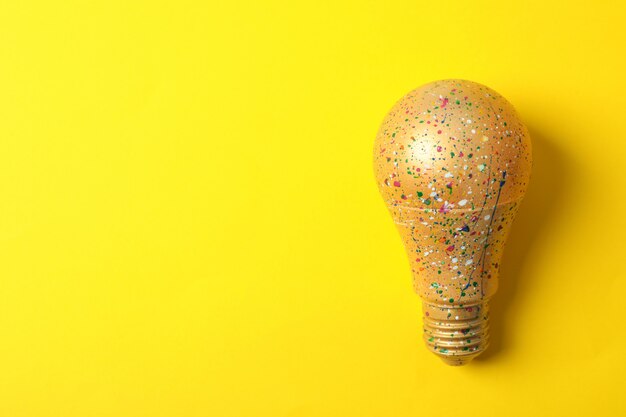 Light bulb with paint splatters