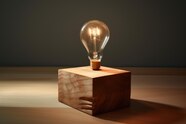 Premium Photo Light Bulb On Wooden Block Ideas And Creativity Concept 