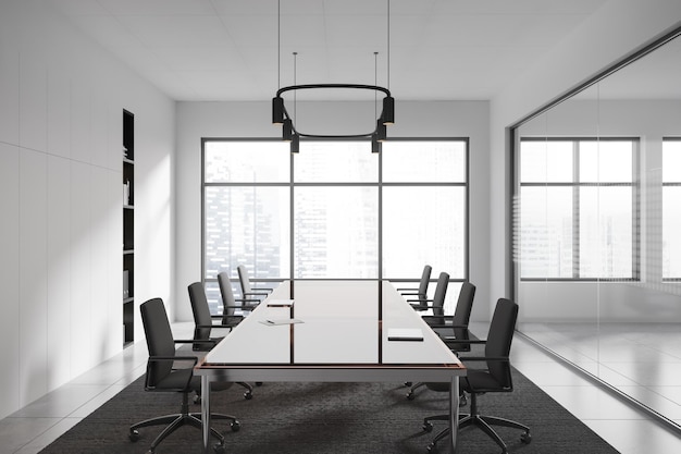 Light business room interior with table and armchairs panoramic window