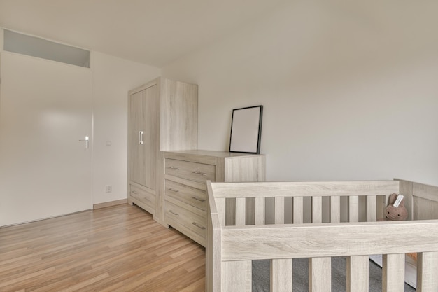 Light cozy baby room with cot