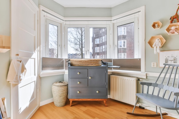 Light cozy baby room with cot