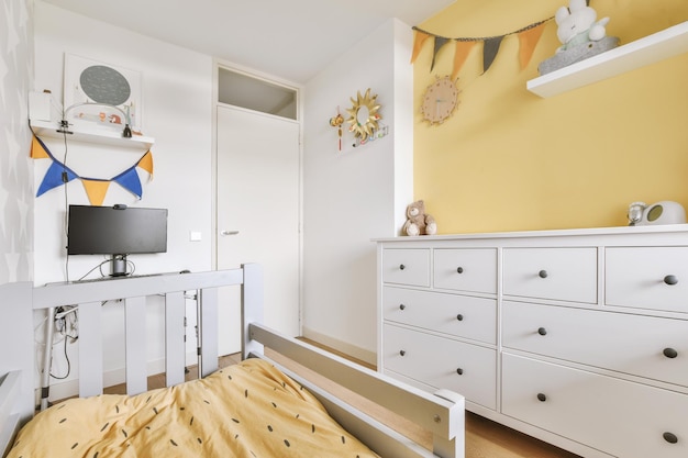 Light cozy baby room with cot