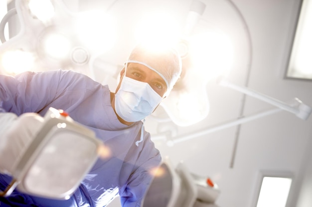 A light at the end of the tunnel Patients view of a doctor trying to resuscitate himher with a defibrillator