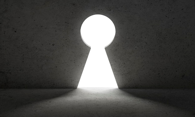 Light from Keyhole door dark wall business concept