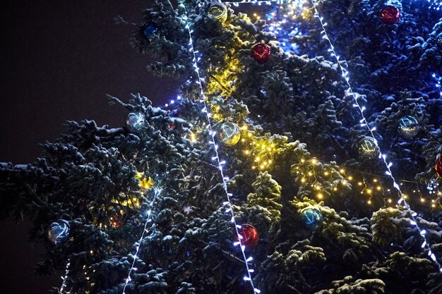 Light garland and balls on Christmas tree