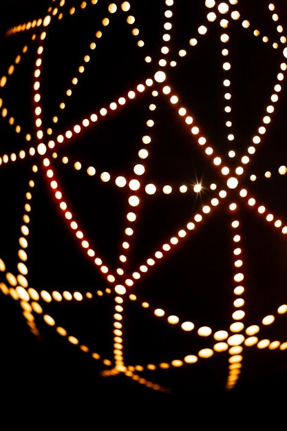 Light lamp built with dried pumpkins and used as a design object