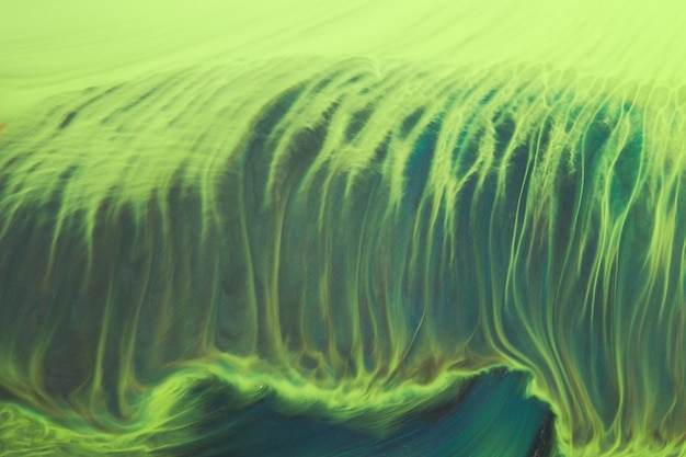 緑の色の創造的な背景の光の混合 抽象芸術プリント 水彩画の汚れとしみ アルコール インクの流れ