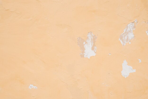 Light orange peeling wall with plaster