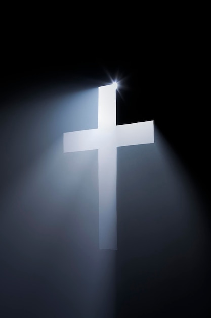 light passing through cross shape in wall