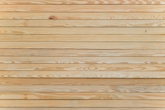 Photo light pine wood texture with horizontal planks.