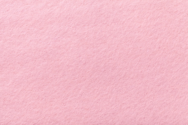 Light pink matt suede fabric  Velvet texture of felt,