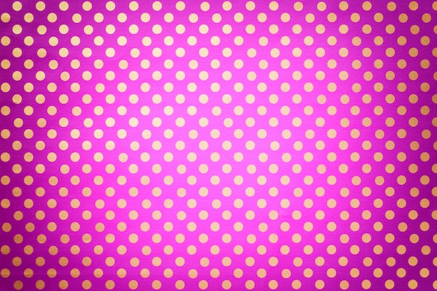 Light purple from wrapping paper with a pattern of golden polka dot