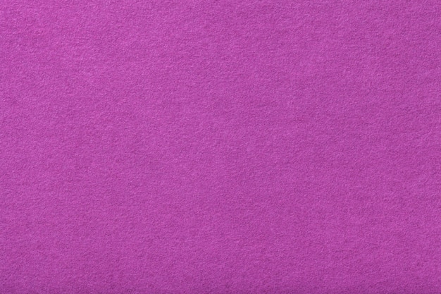 Light purple matt suede fabric closeup. Velvet texture of felt.