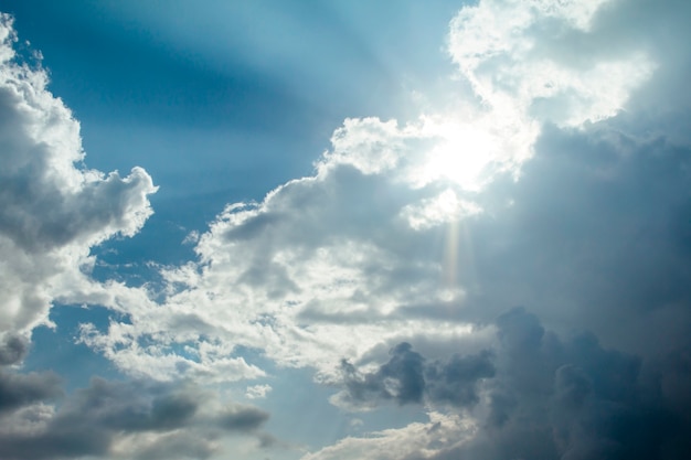 light rays on dramatic moody blue sky