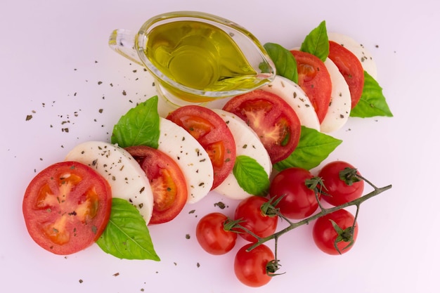 Light saprese salad on a white background Flat lei