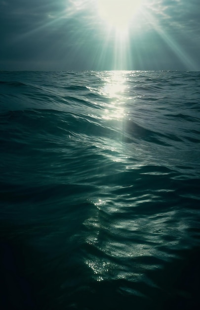 A light shines on the water in the ocean.