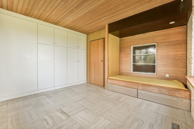 Light simple bedroom interior with parquet wall