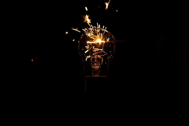 Light and sparks from a burning incandescent lamp Short circuit