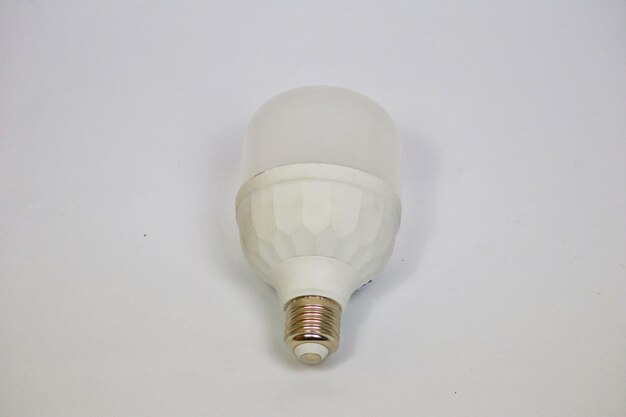 a light that is turned off with a white background.