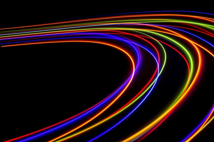 Photo light trails against black background
