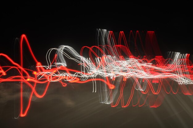 Photo light trails against black background