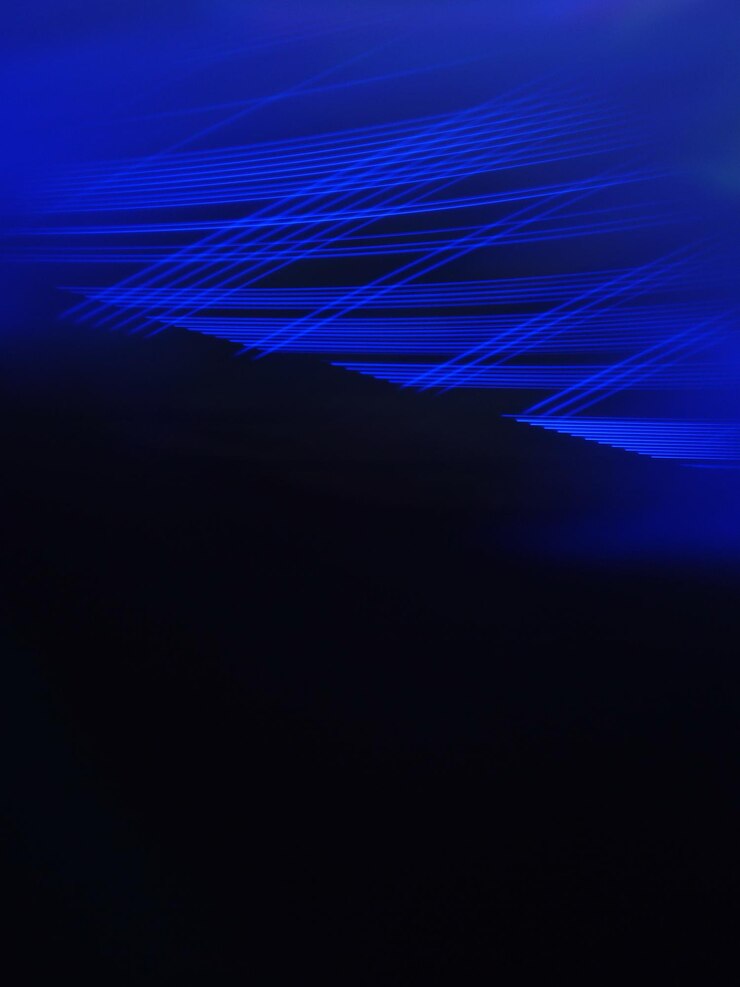 Photo 夜の青い空に照らされた光の痕跡