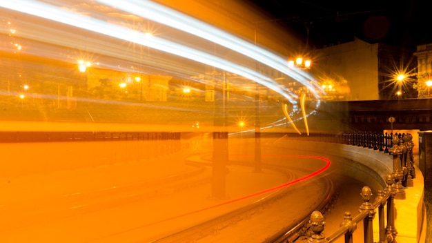 Light trails of cable car in city at night