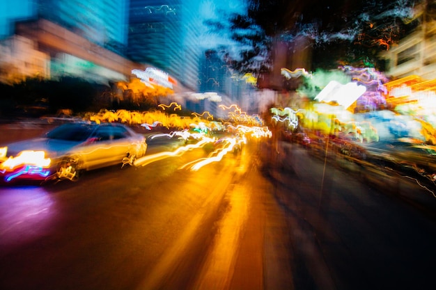 Photo light trails on city street at night