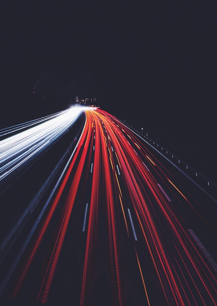 Photo light trails on highway at night