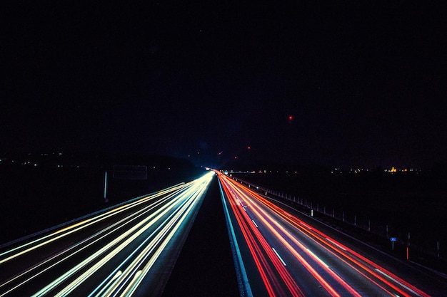 Photo light trails on highway at night