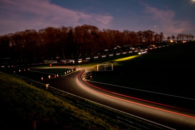 Photo light trails on highway at night