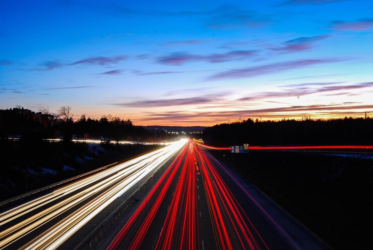 Photo light trails on highway at night