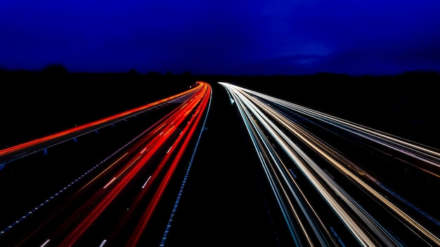 Photo light trails on highway at night