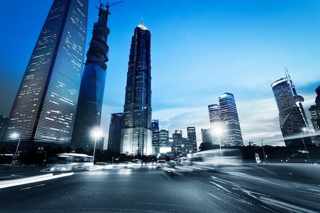 The light trails on the modern building background in shanghai china