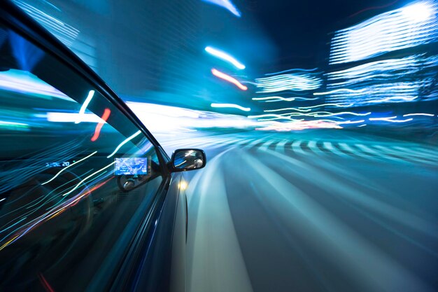 Photo light trails on road in city at night