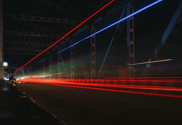 Photo light trails on road in city at night