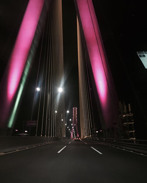 Photo light trails on road at night