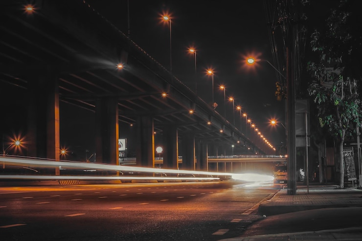 Photo light trails on road at night
