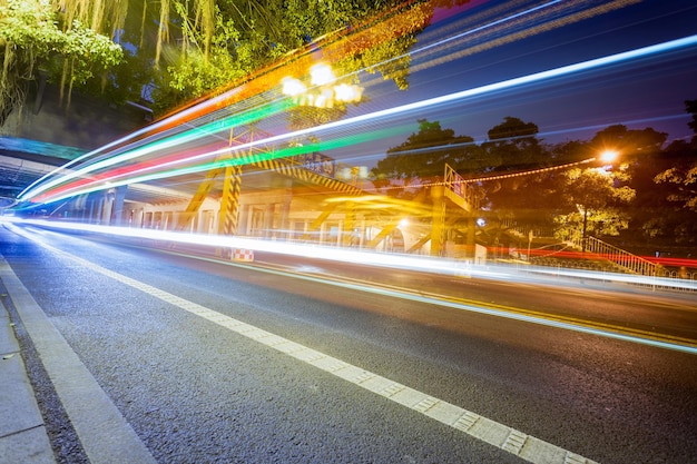 Photo light trails on road at night