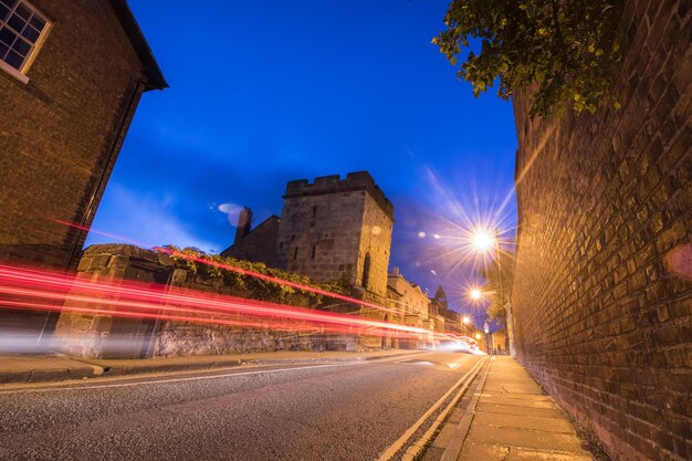 Photo light trails on road at night