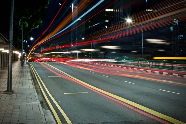 Photo light trails on road at night