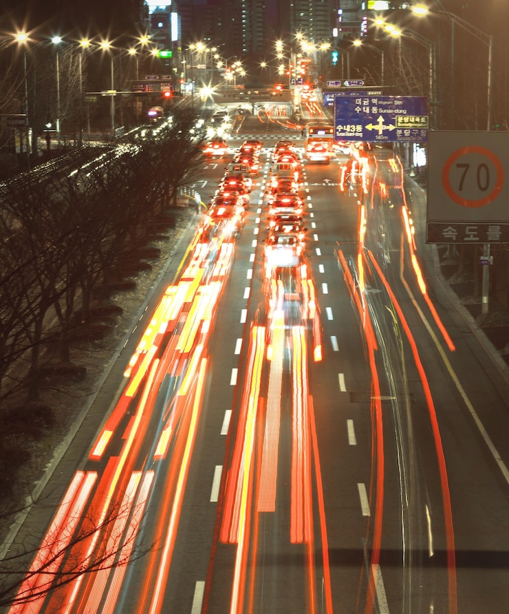 Photo light trails on road at night