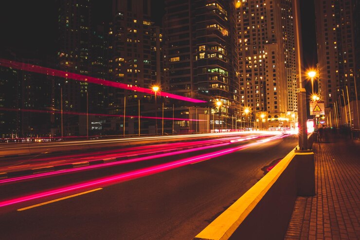 Photo light trails on road at night