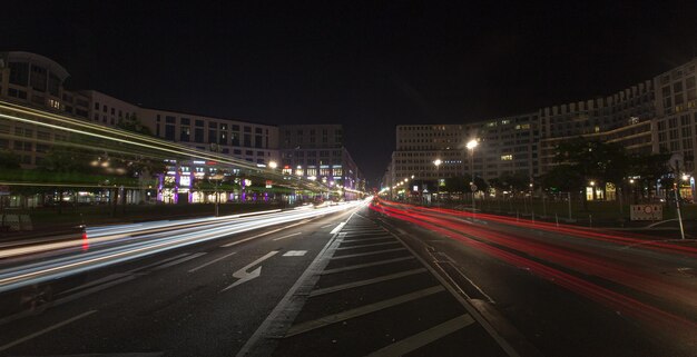 Photo light trails on road at night