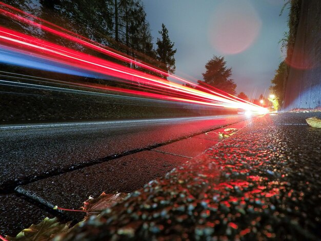 Photo light trails on street at night