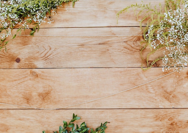 Light wood decorated with plants and flowers Wooden texture background mockup background