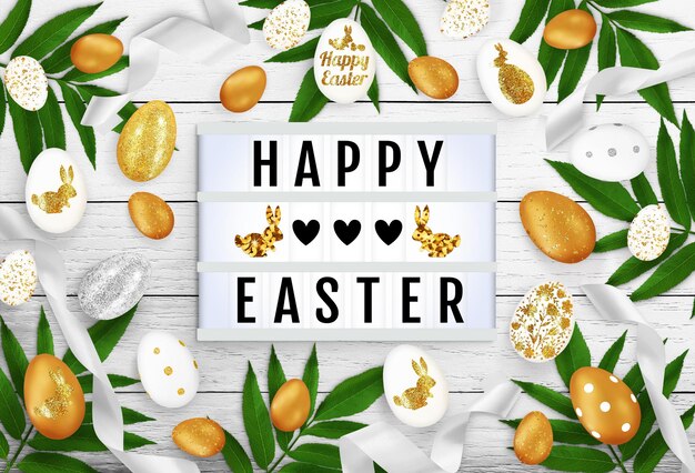 Lightbox, eggs, ribbons, leaves on wooden background. Eggs with flowers, bunnies. Text frame of the lightbox with the inscription Happy Easter. Easter holiday advertising content. Top view, close up